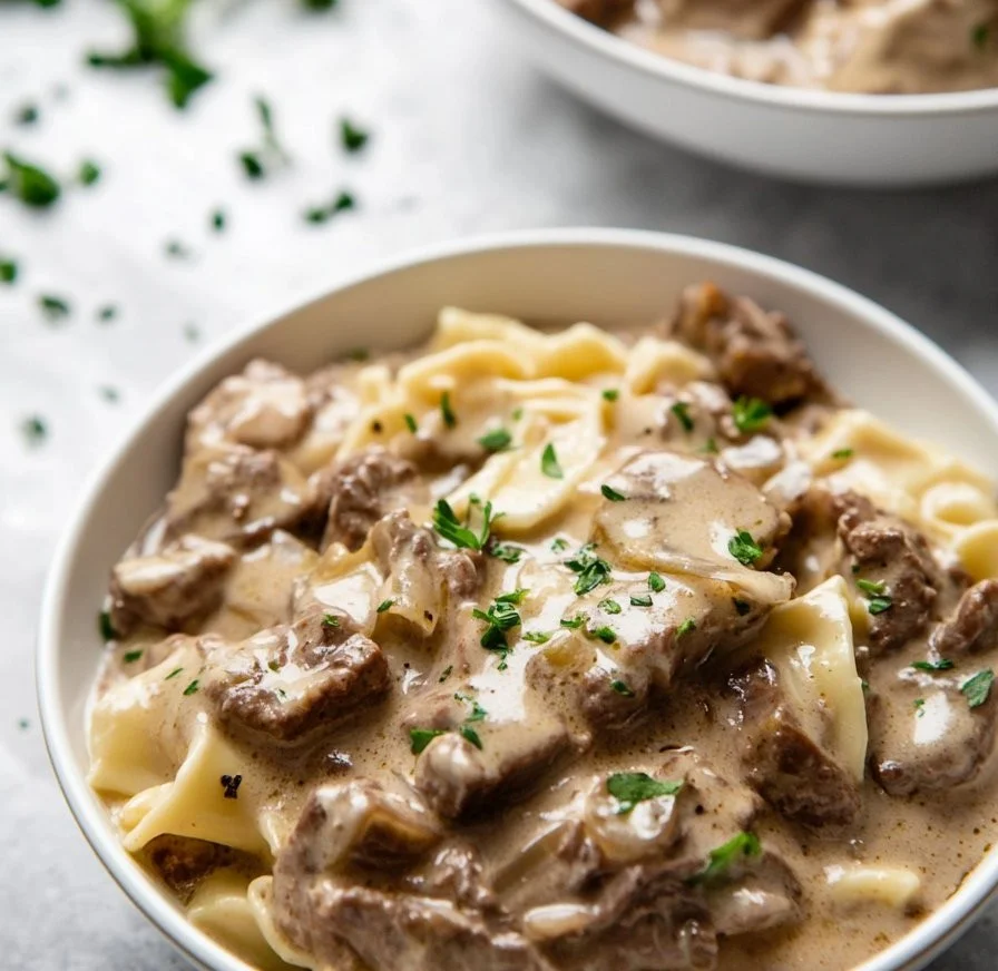Delicious Beef Stroganoff served with creamy sauce and noodles